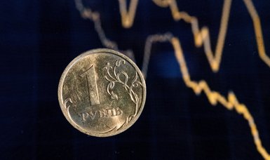 Russian rouble hovers near 96 vs dollar