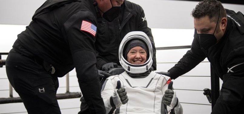 SPACEX RETURNS 4 ASTRONAUTS TO EARTH, ENDING 200-DAY FLIGHT