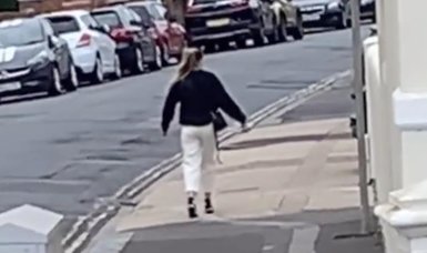 Video of U.S. woman that appeared to be frozen in time while walking down street goes viral
