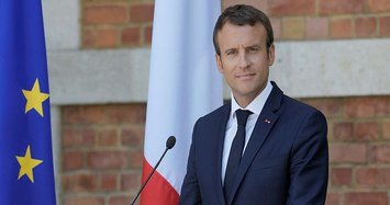 French President Macron's popularity rating slumps a further 14 points in August