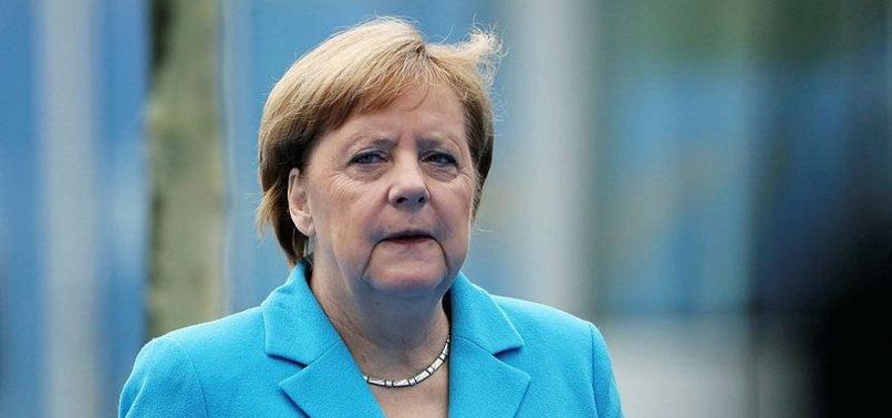 MERKEL SAYS CLEAR COMMITMENT TO NATO BY ALL