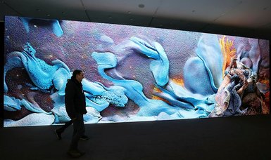 Turkish media artist Refik Anadol addresses climate change with AI-driven installation at Davos