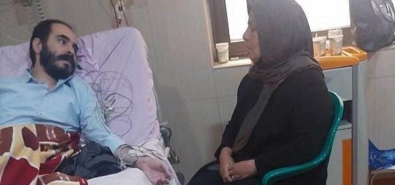 IRAN HUNGER STRIKER BACK IN PRISON AFTER HOSPITAL TREATMENT