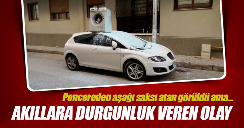 Arabanın üzerine çamaşır makinesi attı
