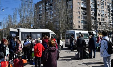 Civilians trickle out of Kramatorsk after station attack