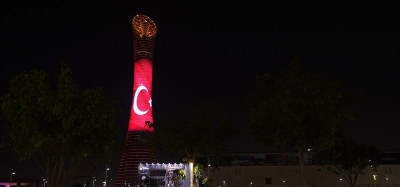 LANDMARK BUILDINGS IN DOHA ILLUMINATED IN COLORS OF TURKISH FLAG