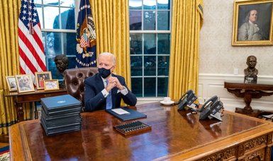 Biden signs 17 orders in sweeping erasure of Trump acts