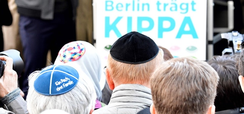 GERMANS WEARING SKULLCAPS TAKE TO THE STREETS TO PROTEST RISING ANTI-SEMITISM