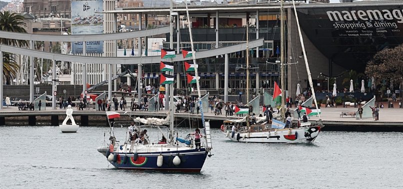 GAZA-BOUND AID FLOTILLA SETS SAIL SYMBOLICALLY, DELAYS INTERNATIONAL WATERS DEPARTURE