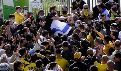 Beitar Jerusalem's anti-Arab fans clash over UAE investment