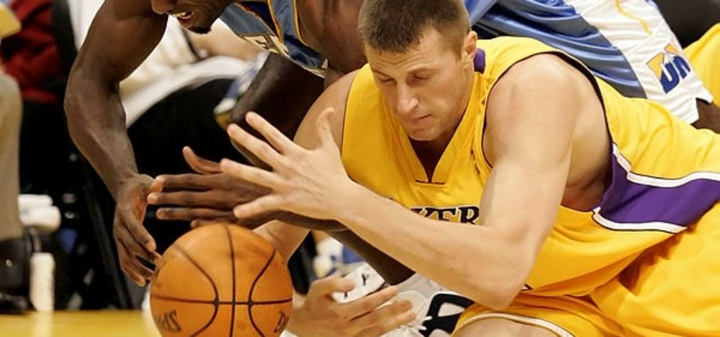 MEDVEDENKO, FORMER LAKER, AUCTIONS NBA TITLE RINGS FOR UKRAINE