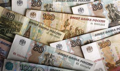 Russian rouble mostly unchanged against US dollar