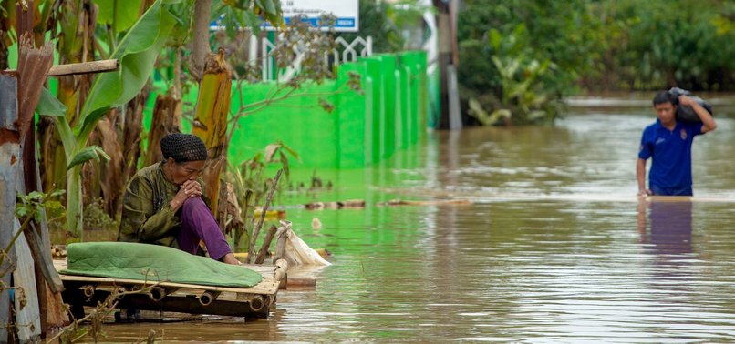 DEATH TOLL FROM INDONESIAN FLOODS, LANDSLIDES, CLIMBS TO 59