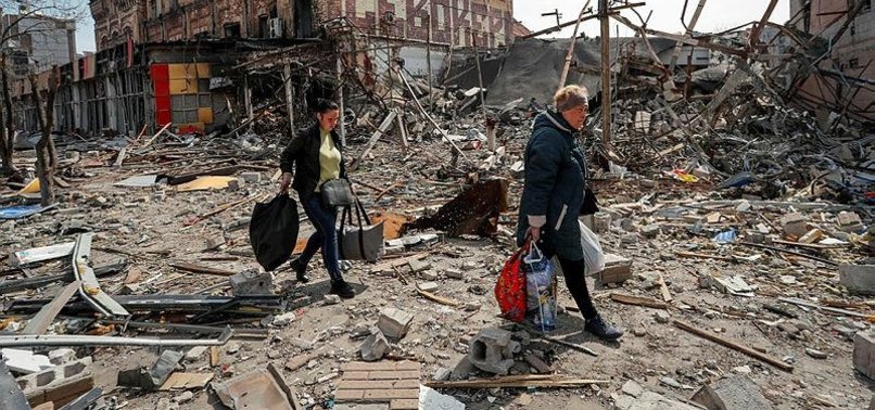 RESIDENTS OF CAPTURED UKRAINIAN PORT CITY OF MARIUPOL TRY TO SURVIVE AMONG ITS RUINS