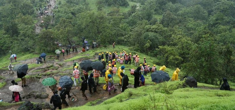 DEATH TOLL IN INDIAN LANDSLIDE RISES TO 26, DOZENS MORE FEARED TRAPPED