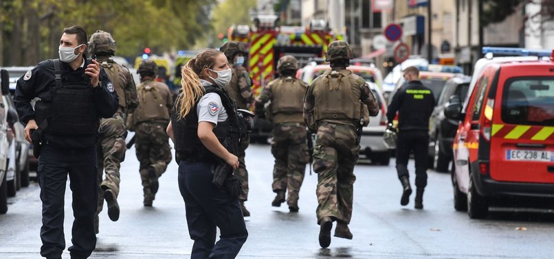 TERROR PROBE OPENED AFTER 2 STABBED IN PARIS; 2 ARRESTS