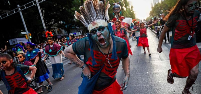 THOUSANDS FLOCK TO DAY OF THE DEAD PARADE IN MEXICO CITY