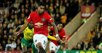 Man United sink Norwich to claim first away league win