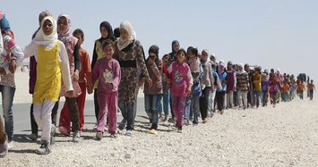 Turkey says 'no choice' in easing border controls for refugees