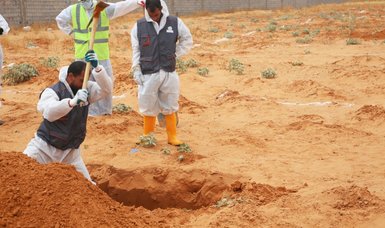 Libya exhumes 11 bodies from mass grave in Sirte