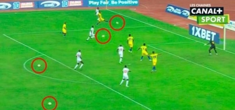 BALL BOYS THROW EXTRA BALLS ONTO PITCH DURING TANZANIAS AFRICA CUP OF NATIONS QUALIFIER AGAINST NIGER