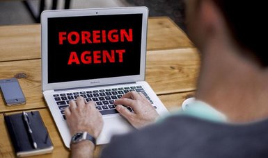 Russia declares top journalist and video blogger 'foreign agents'