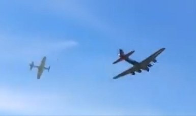 Bomber, plane collide at Dallas air show, video shows