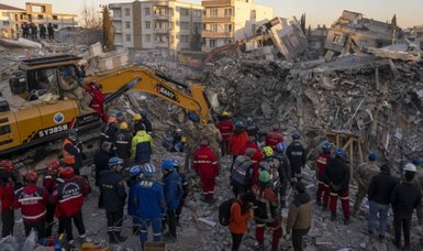 Earthquake survivors still being pulled from ruins despite long odds