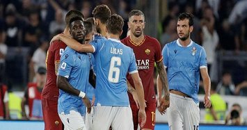 Lazio and Roma share points in lively Rome derby