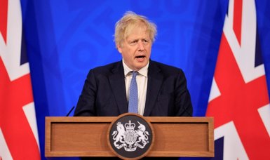 Britain's Johnson defies calls to quit despite 'painful report'