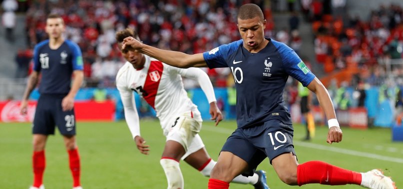 TEENAGER MBAPPE SENDS FRANCE THROUGH AS PERU KNOCKED OUT