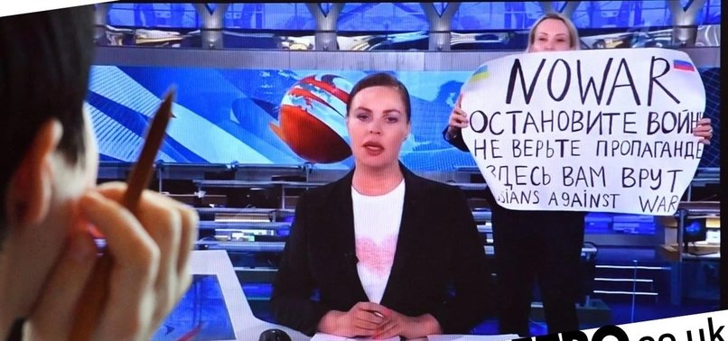 RUSSIAN TV EDITOR WHO PROTESTED WAR ON-AIR ESCAPES HOUSE ARREST