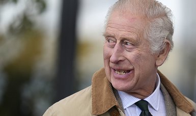 Britain's King Charles hands over military role to son William