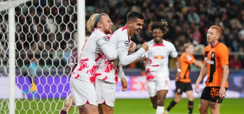 LEIPZIG CRUISE PAST SHAKHTAR TO REACH CHAMPIONS LEAGUE LAST 16