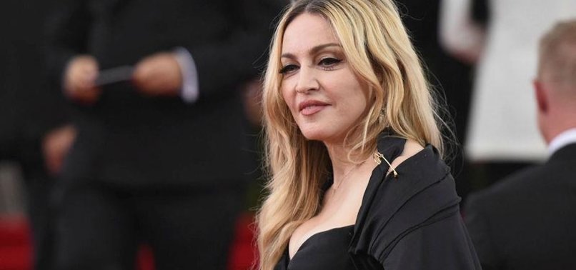 MADONNA ACCEPTS DAMAGES FROM PUBLISHER OVER PRIVACY INVASION