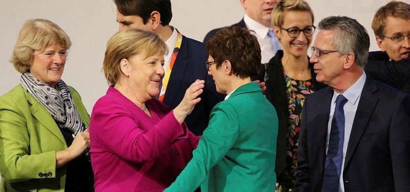 GERMANYS NEW CDU CHIEF TO REVIEW LIBERAL MERKEL MIGRATION POLICIES