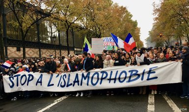 French Muslims accuse Emmanuel Macron of dividing society with anti-Islamic policies