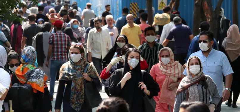 IRAN SAYS VIRUS DEATH TOLL TOPS 13,000