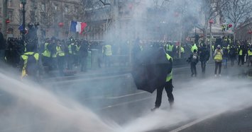 French 'yellow vests' march through Paris to denounce police violence
