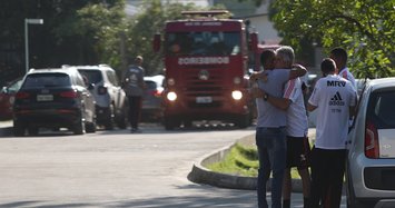 Fire at Brazilian soccer team complex leaves 10 dead, 3 hurt