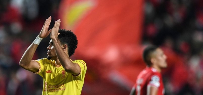 LIVERPOOL WIN AT BENFICA AND CITY EDGE ATLETICO