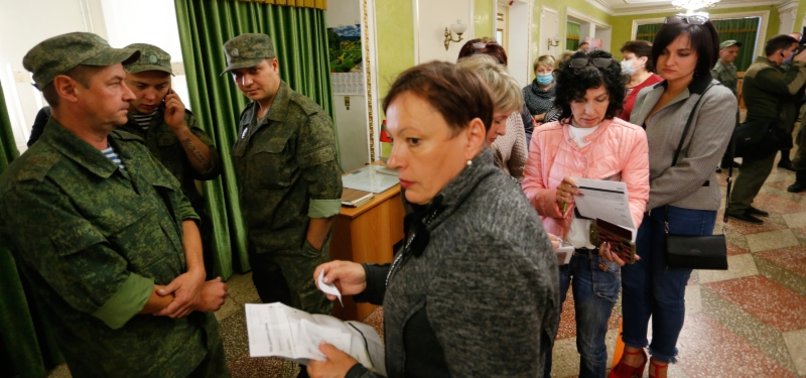 UKRAINIANS VOTE IN RUSSIAN ELECTION DESPITE CRITICISM FROM KIEV