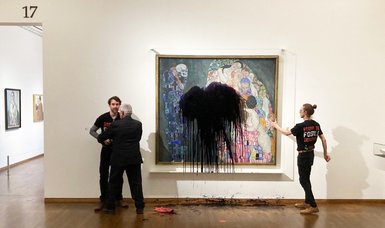 Climate activists hurl oil at Klimt painting in Vienna