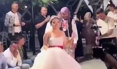 Controversial wedding ritual of bride walking groom on leash goes viral