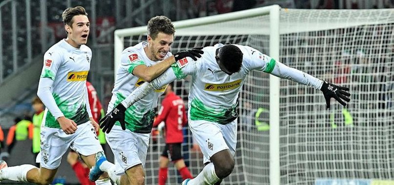 EMBOLO SCORES 2 TO LIFT GLADBACH BACK TO TOP OF BUNDESLIGA