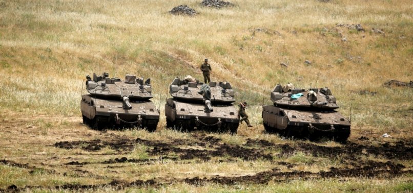 ISRAEL DISPATCHES TANKS TO GAZA BORDER AS TENSIONS RISE