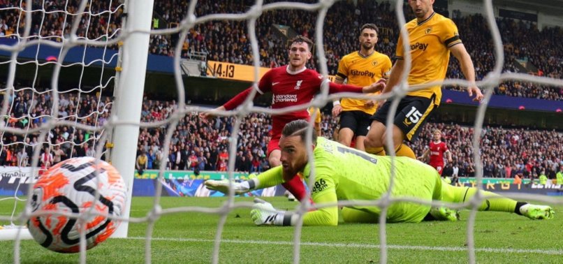 LIVERPOOL GO TOP OF THE LEAGUE WITH 3-1 WIN AT WOLVES