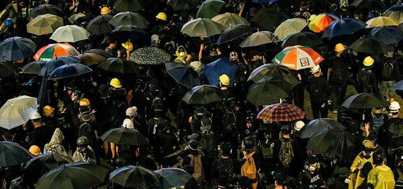 HONG KONG PRO-DEMOCRACY RALLY ENDS EARLY AS VIOLENCE ERUPTS