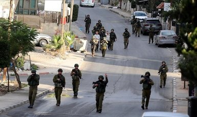 Israeli forces raid Jenin refugee camp in West Bank amid clashes