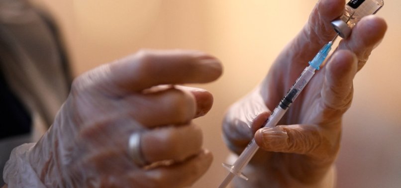 WHO SEES INCREDIBLY LOW COVID, FLU VACCINATION RATES AS CASES SURGE
